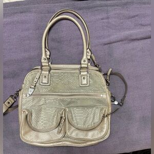 Aimee Kestenburg rose gold snake print leather hobo bag